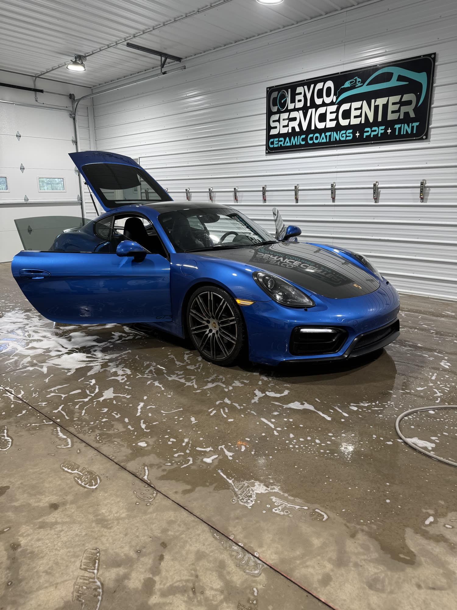 Ceramic coating maintenance wash on a Porsche Cayman in Lewisburg, PA