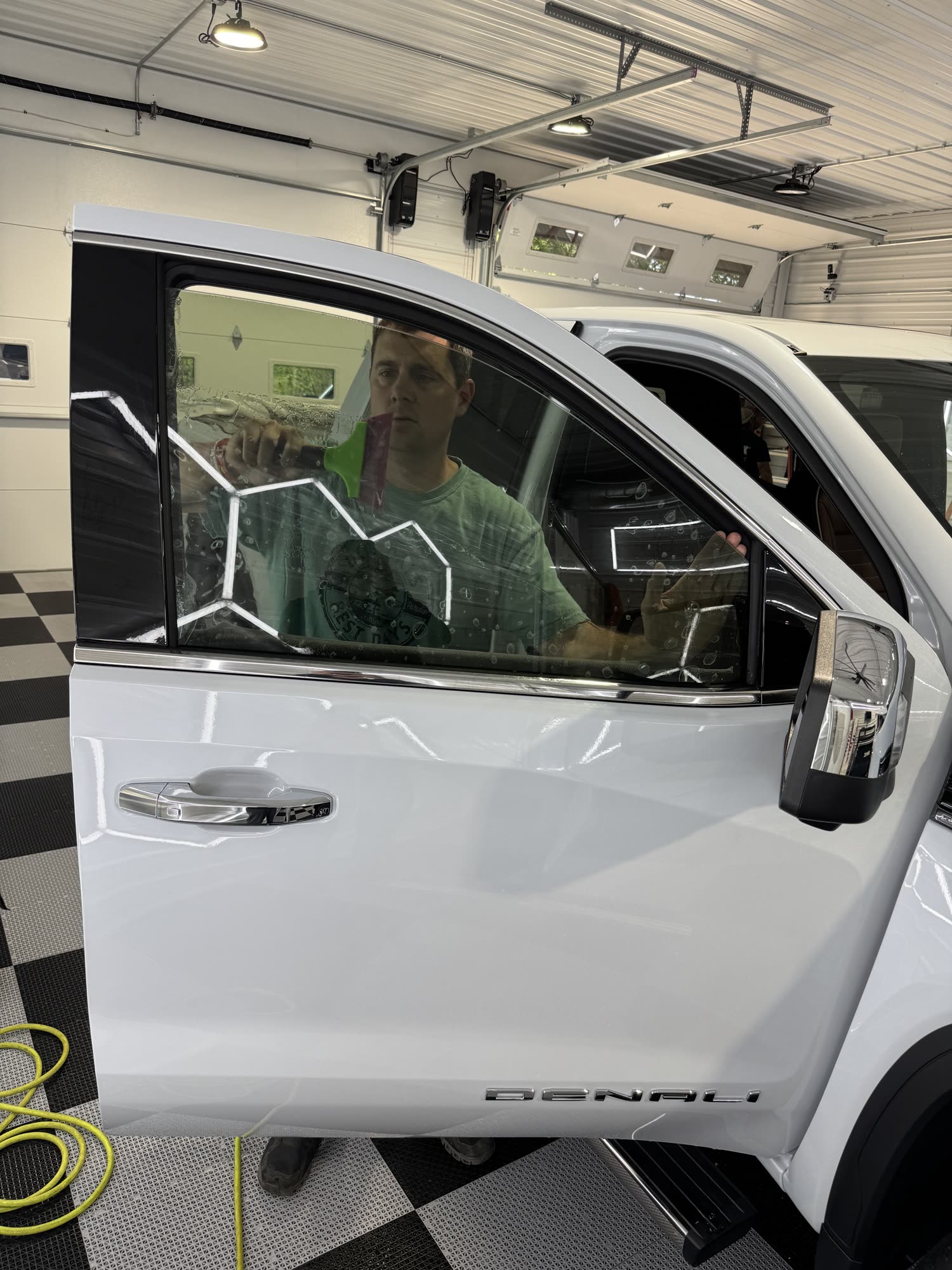 Window tint installation on a GMC Denali in Lewisburg, PA
